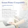 A woman in a striped shirt is looking at a tablet, with a printer in the foreground and text about printer compatibility. Produktbild-Vorschau