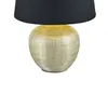 A close-up studio shot of a table lamp with a gold textured base and a black lampshade. Náhled obrázku produktu