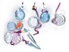 A collection of Disney Frozen 2 themed jewelry making accessories, including charms, beads, and tools, arranged on a white background. Produktbild-Vorschau