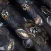 A close-up view of a dark floral fabric pattern with metallic accents. Produktbild-Vorschau