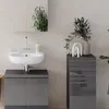 A modern bathroom vanity with a sink and cabinet. Náhľad obrázku produktu
