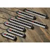 Several power strips are arranged diagonally on a wooden surface. Produktbild-Vorschau
