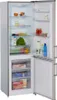 An open refrigerator with food items inside. Produktbild-Vorschau