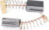 Two carbon brushes with springs and copper wires, used in electric motors. Produktbild-Vorschau
