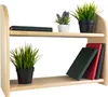 A two-tier wooden shelf with decorative items. Voir les images du produit