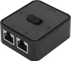 A black network switch with two RJ45 ports and a toggle switch on top. Náhľad obrázku produktu