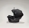 A black Joie Signature baby car seat is shown in profile against a light gray background. Produktbild-Vorschau