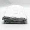 A folded white weighted blanket is presented against a white background. Podgląd zdjęcia produktu