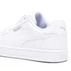 A close-up, side view of a white Puma sneaker. Produktbild-Vorschau