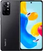 A black Xiaomi Redmi Note 11S 5G smartphone is shown from the back and side, with its screen displaying a colorful abstract image. Voir les images du produit