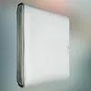 A folded silver tarp is shown in a studio setting with a gradient background. Produktbild-Vorschau