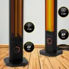 Two infrared heaters are shown in a room with wooden floors and a white wall. The heaters are black and have glowing orange and yellow heating elements. Náhled obrázku produktu