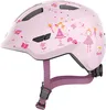 A pink children's bicycle helmet with princess and butterfly decorations. Náhled obrázku produktu