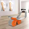 A fitness roller for abdominal muscles is shown on a wooden floor, with a split image in the background showing a person's torso before and after using the product. Produktbild-Vorschau
