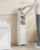 A person is reaching into a tall, narrow white cabinet in a bathroom setting. Produktbild-Vorschau
