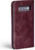 A close-up side view of a burgundy flip case for a smartphone. Produktbild-Vorschau