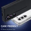 Close-up view of two phone cases, one black and one white, showing the camera lens area. Anteprima dell’immagine prodotto