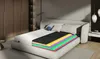 A cutaway view of a mattress showing its layered construction, placed on a bed in a bedroom setting. Produktbild-Vorschau