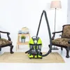 A wet and dry vacuum cleaner is placed on a rug in a room with two chairs and a floor lamp. Anteprima dell’immagine prodotto