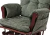 Close-up view of a green upholstered glider chair. Voir les images du produit