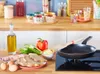 A kitchen counter with ingredients and cookware laid out for a meal. Produktbild-Vorschau