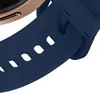 A close-up view of a navy blue watch band attached to a rose gold watch case. Produktbild-Vorschau