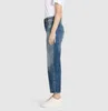 A person wearing jeans and a t-shirt, shown from the side against a plain background. Produktbild-Vorschau