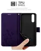 A hand is holding open a purple flip phone case, revealing the black TPU shell inside. Náhled obrázku produktu