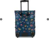 A floral patterned shopping roller bag with a retractable handle and wheels. Produktbild-Vorschau