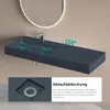 A dark blue wall-mounted sink with a faucet and a flat countertop area. Produktbild-Vorschau