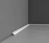 A corner of a room with white baseboard molding installed along the floor and wall. Produktbild-Vorschau