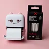 A cute, cat-themed mini printer and its packaging are displayed on a pink background. Produktbild-Vorschau