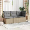 An outdoor patio setting with a beige poly rattan sofa and gray cushions. Anteprima dell’immagine prodotto