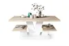 A modern coffee table with a wood-effect top and white base, displayed on a white background. Produktbild-Vorschau