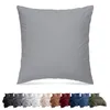 A large grey pillow is shown in the foreground, with a row of smaller bedding sets in various colors displayed below it. Produktbild-Vorschau
