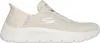 A side view of a single beige Skechers sneaker against a white background. Voir les images du produit