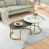 A living room setting with a sofa and a rug, featuring a set of nesting coffee tables. Produktbild-Vorschau