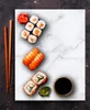 A top-down view of a marble cutting board with sushi and chopsticks. Produktbild-Vorschau