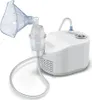 A white Omron C101 Essential nebulizer with its attached mask and tubing is shown against a white background. Náhled obrázku produktu