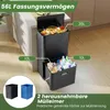 A black multi-compartment trash can with two pull-out bins, shown in a kitchen setting. Podgląd zdjęcia produktu