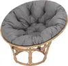 A round cushion on a rattan chair. Produktbild-Vorschau
