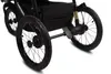 Close-up view of the rear wheels and brake mechanism of a black stroller. Náhled obrázku produktu