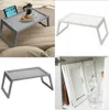 A collage of images showing a foldable bed tray table in different settings and colors. Produktbild-Vorschau