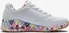 A single white SKECHERS Uno Loving Love shoe with a colorful heart pattern on the sole and lining, shown from a side profile against a white background. Náhled obrázku produktu