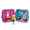 A Lego Friends Stephanie's Magical Cube - Beauty Salon playset, open to reveal its contents, with a Lego mini-figure holding a lipstick. Náhled obrázku produktu