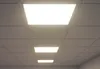 A view of a suspended ceiling with multiple LED light panels, one of which is illuminated. Produktbild-Vorschau