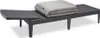 A dark gray plastic sunlounger with a folded gray cushion on top, set against a white background. Produktbild-Vorschau