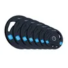 A stack of black weight plates with blue markings for weight values. Voir les images du produit