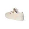 A side view of a beige platform sneaker with a zipper detail. Náhled obrázku produktu