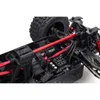 Close-up view of the internal components of an RC car, including suspension, wiring, and electronics. Náhľad obrázku produktu